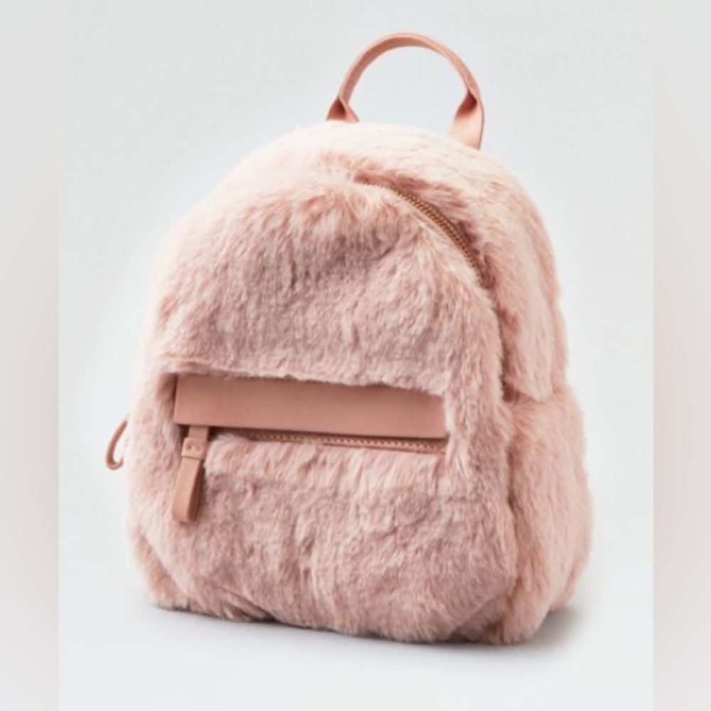 Super cute faux fur light pink American Eagle backpack.